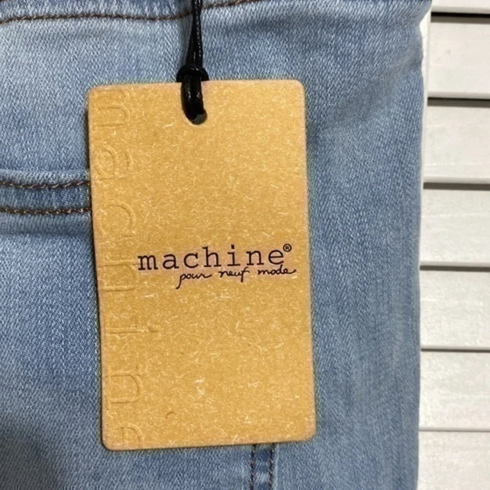 Machine light wash distressed mid rise skinny jeans!!